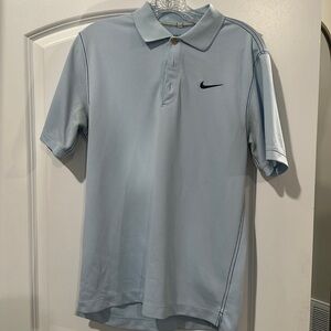 Small blue Nike golf polo